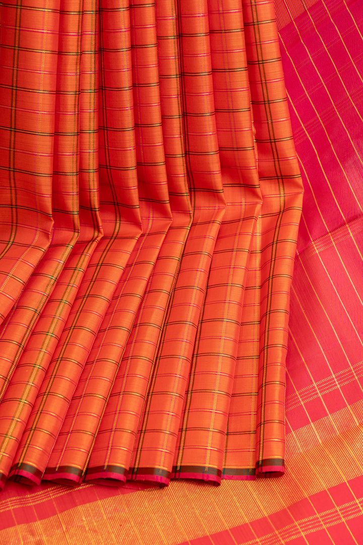 Orange borderless checks pure Kanchipuram silk saree