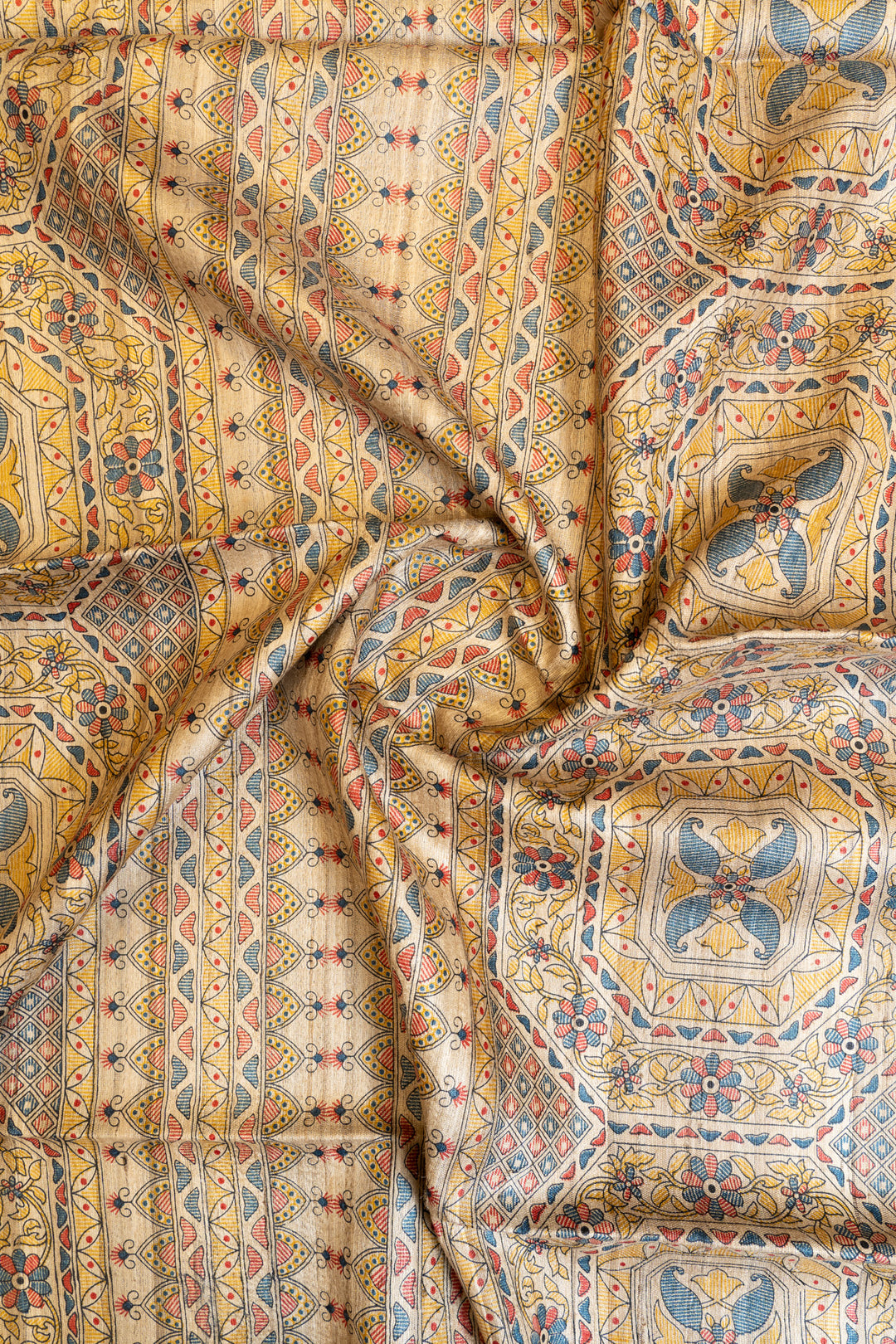 Beige and blue Madhubani handprinted pure Tussar saree