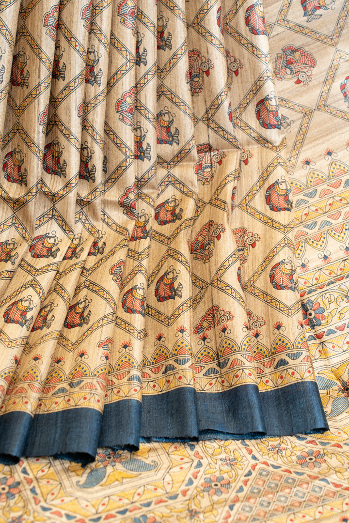 Beige and blue Madhubani handprinted pure Tussar saree