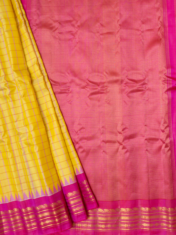 Yellow check and magenta pure Gadwal silk saree
