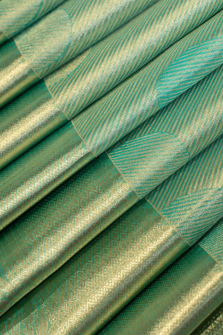 Cyan green tissue brocade pure Kanchipuram silk saree