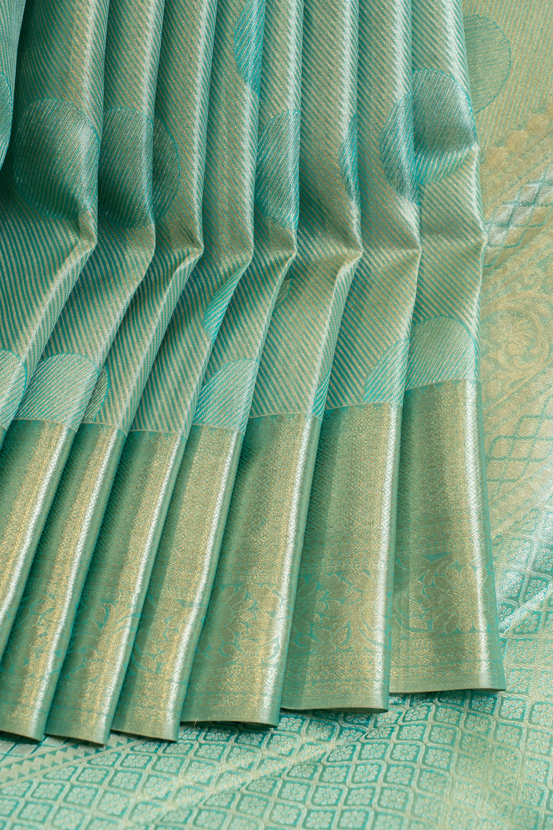 Cyan green tissue brocade pure Kanchipuram silk saree