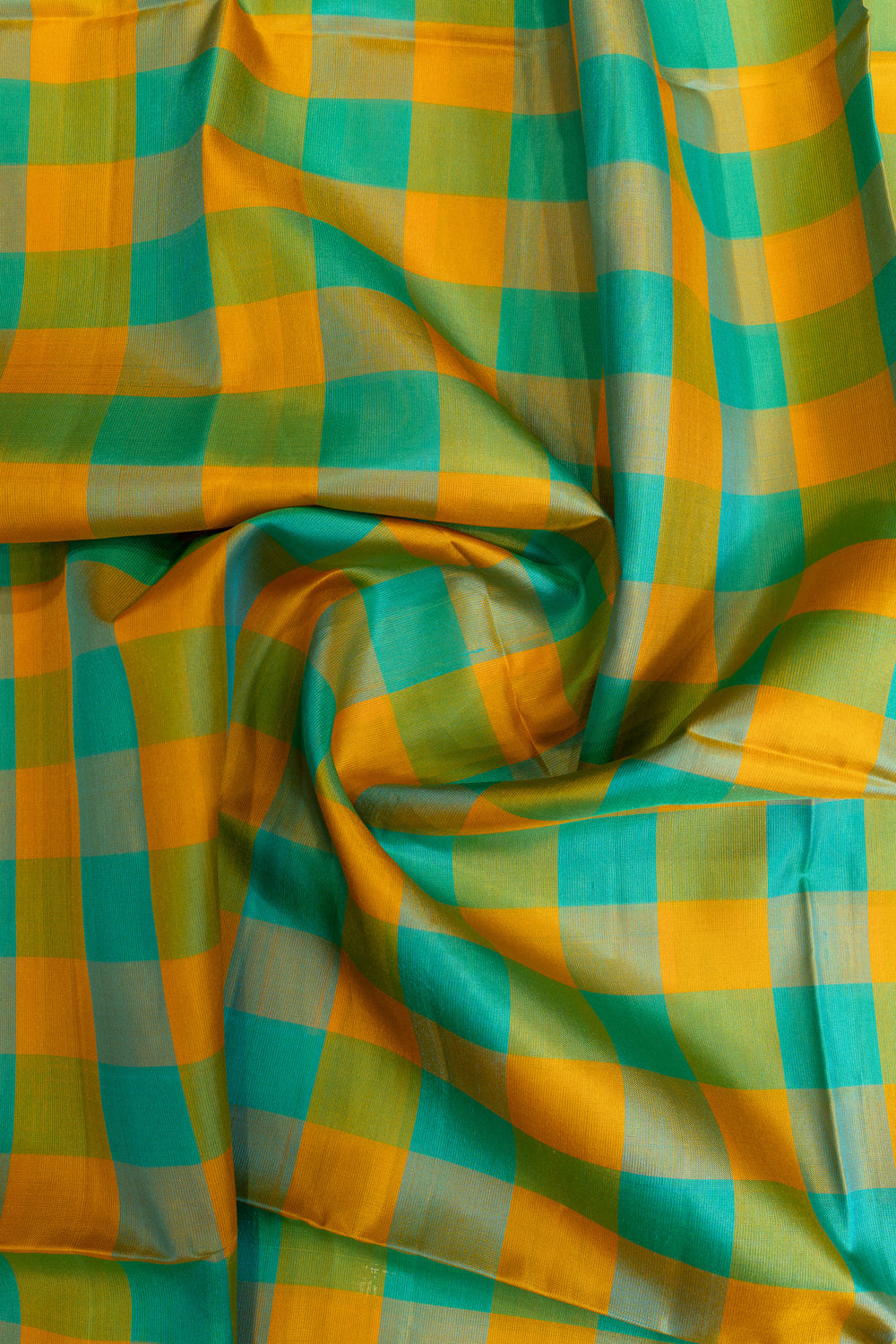 Checkered fabric with green and orange squares