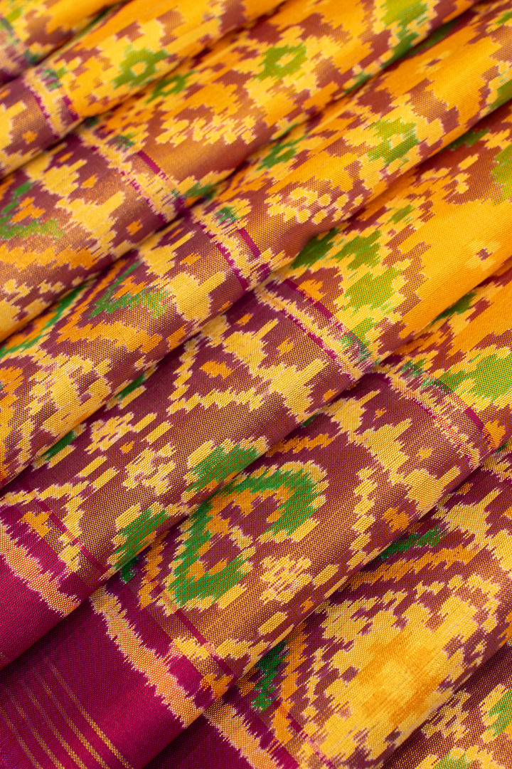 Yellow and pink pure patola ikat silk saree