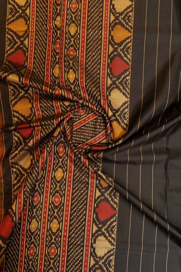 Rust orange and black pure patola ikat silk saree