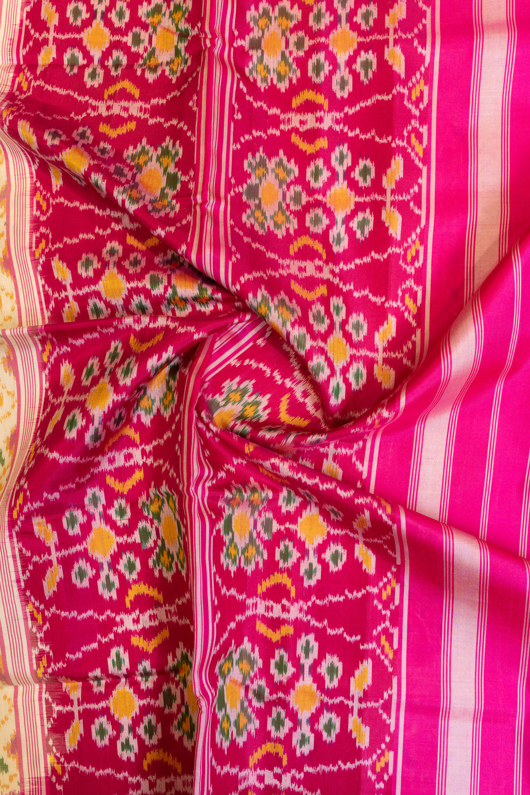 Off white and pink pure Patola ikat silk saree