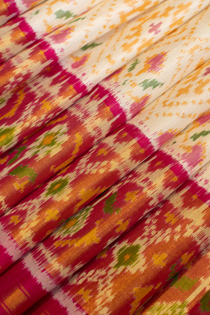 Off white and pink pure Patola ikat silk saree