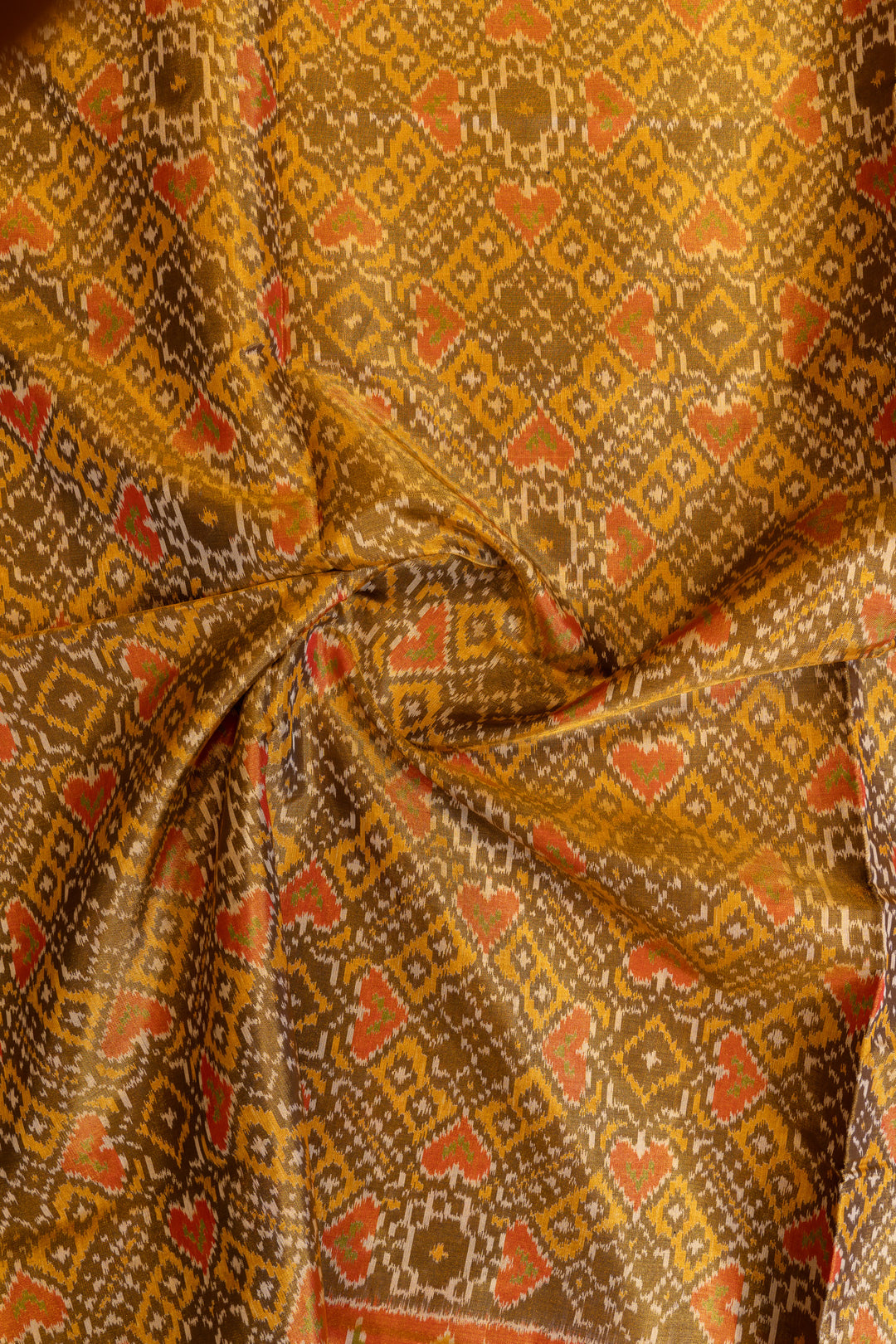 Khaki gold and orange pure patola ikat silk saree