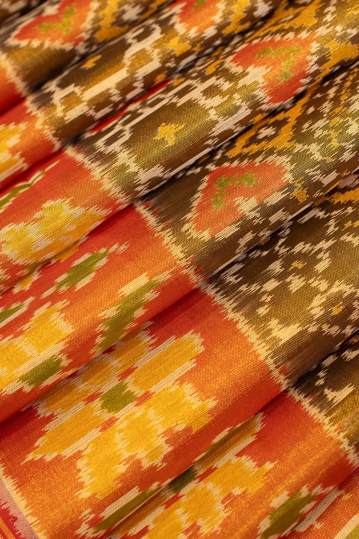 Khaki gold and orange pure patola ikat silk saree