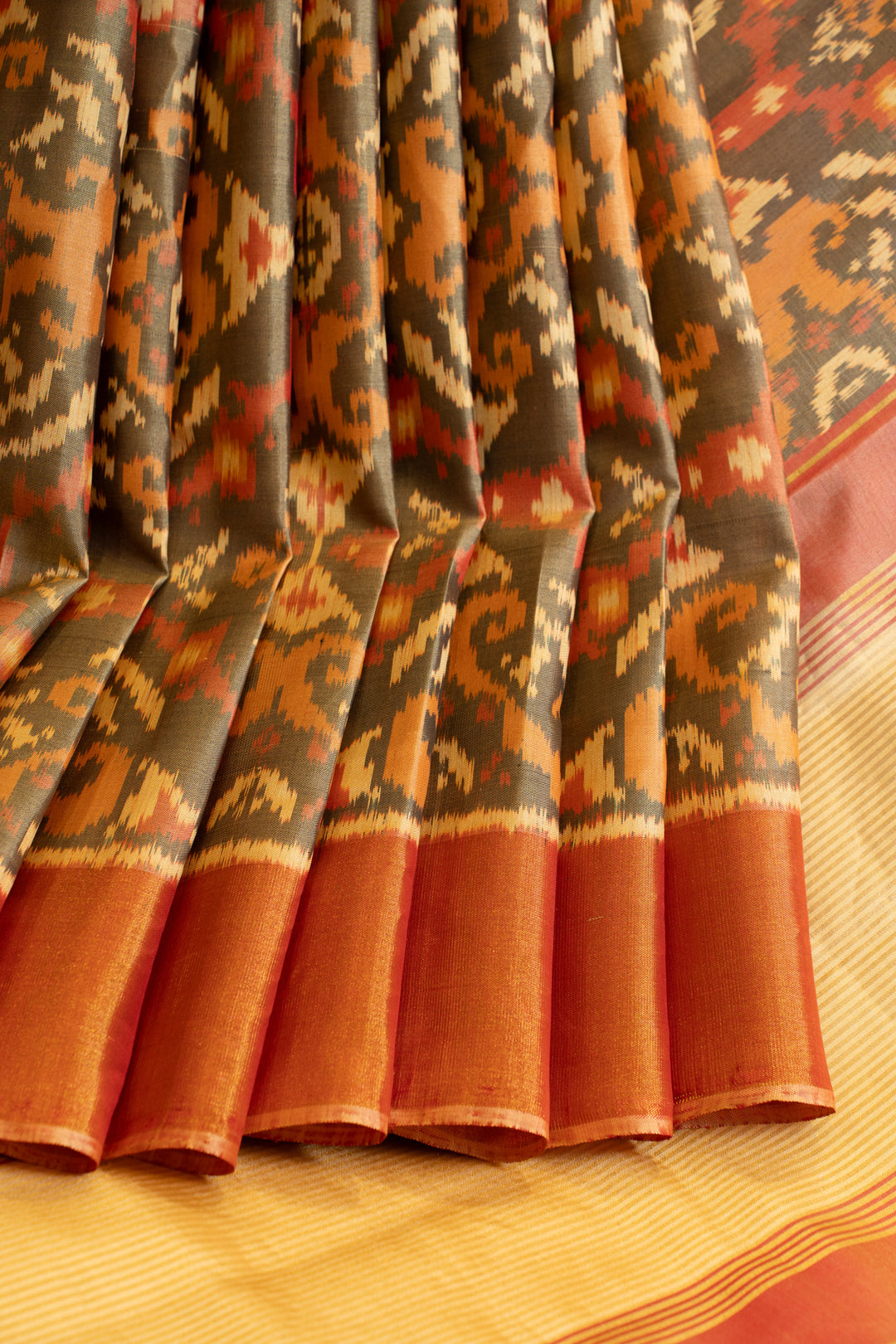 Khaki grey and rust pure ikat patan patola silk saree