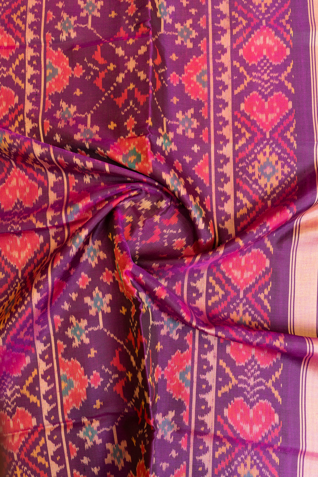 Purple and pink leheriya pure ikat patan patola silk saree