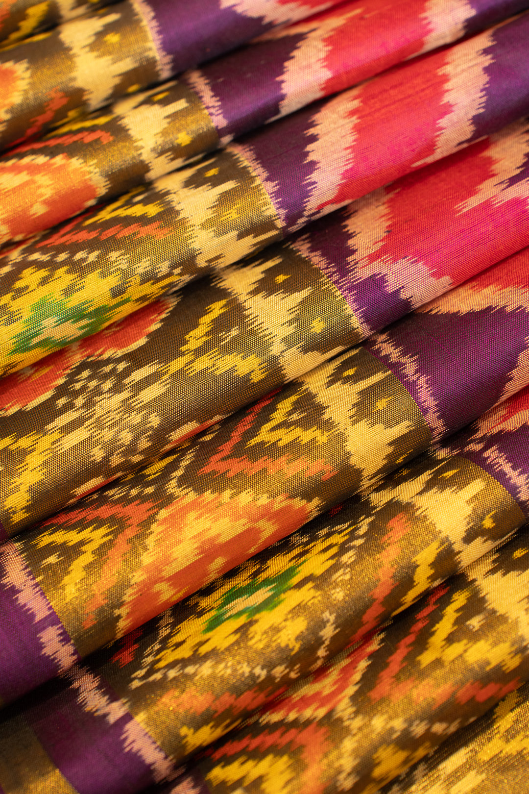 Purple and pink leheriya pure ikat patan patola silk saree