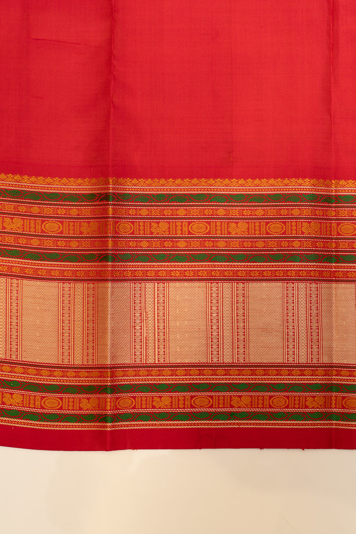 Peacock blue and red threadwork Kanchipuram silk saree