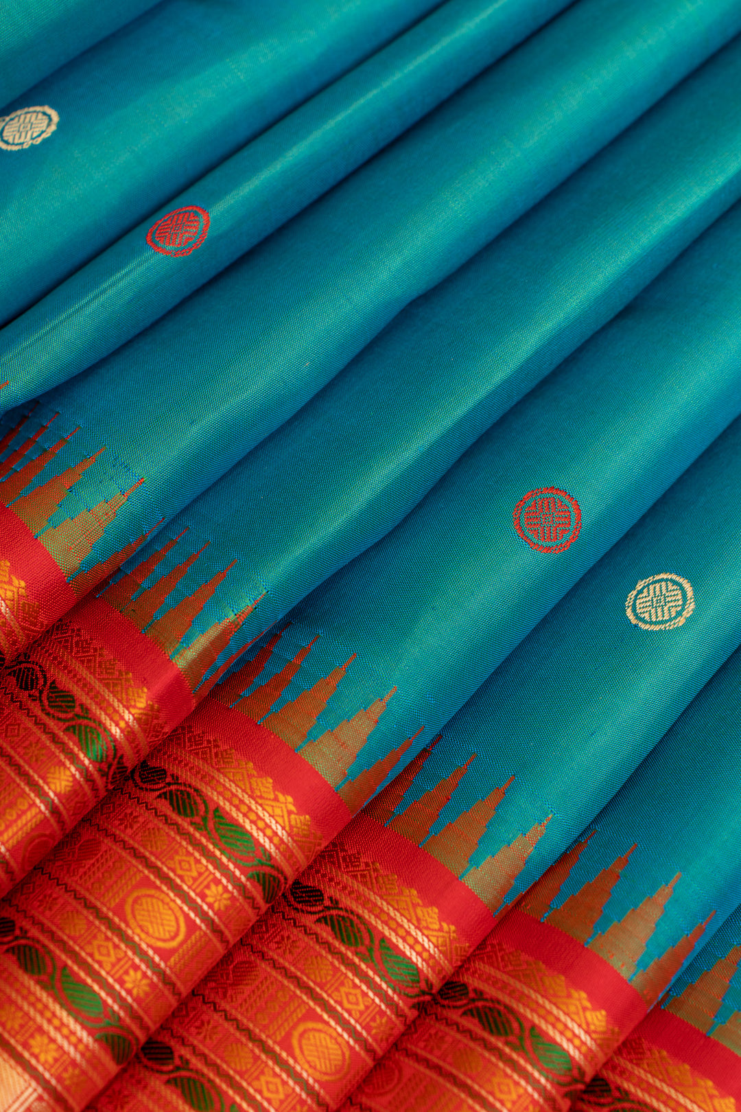 Peacock blue and red threadwork Kanchipuram silk saree