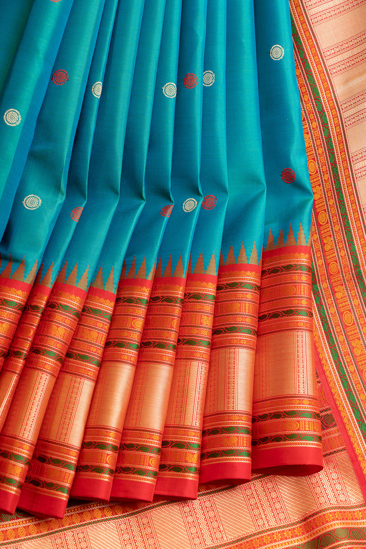 Peacock blue and red threadwork Kanchipuram silk saree