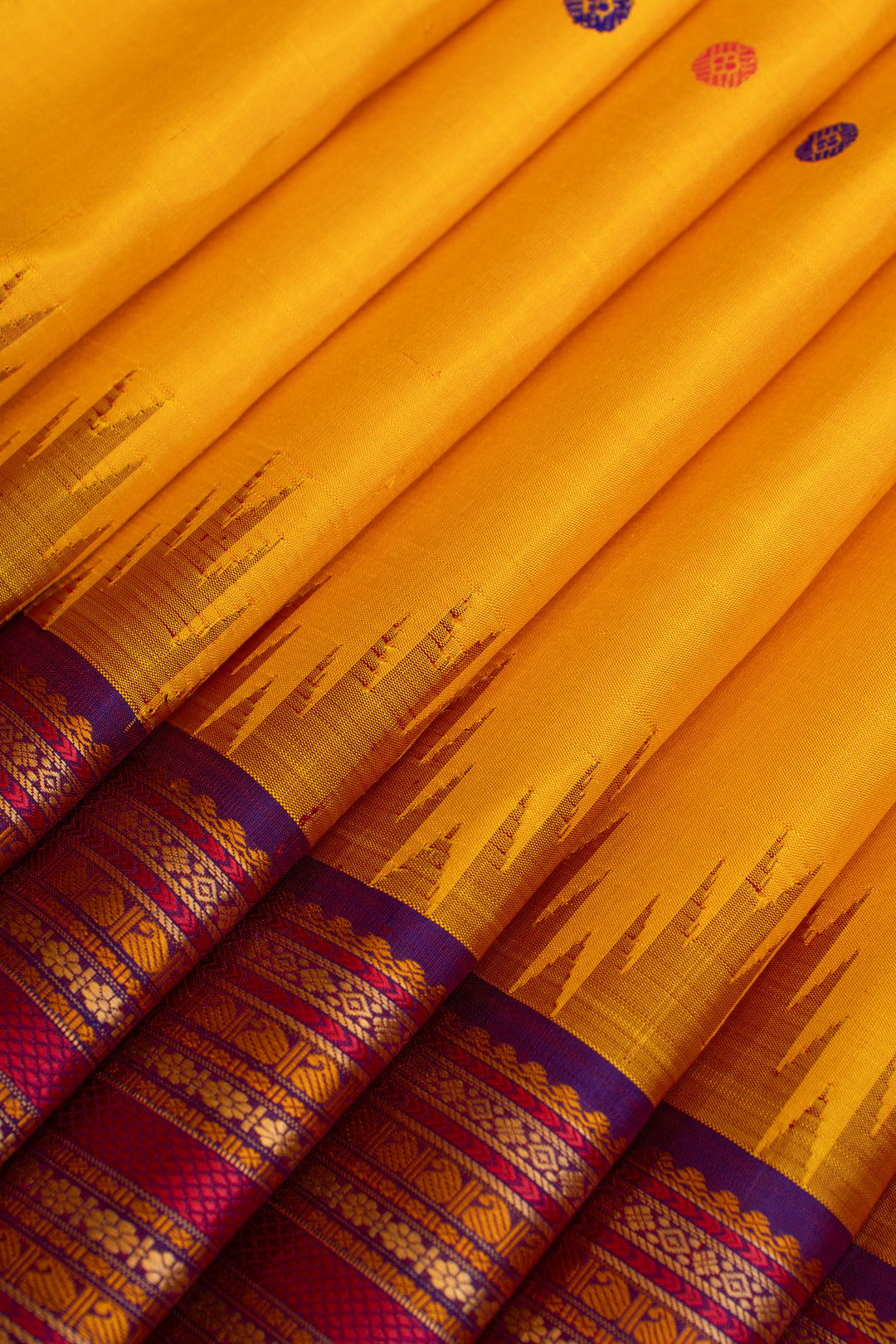 Yellow and purple threadwork Kanchipuram silk saree