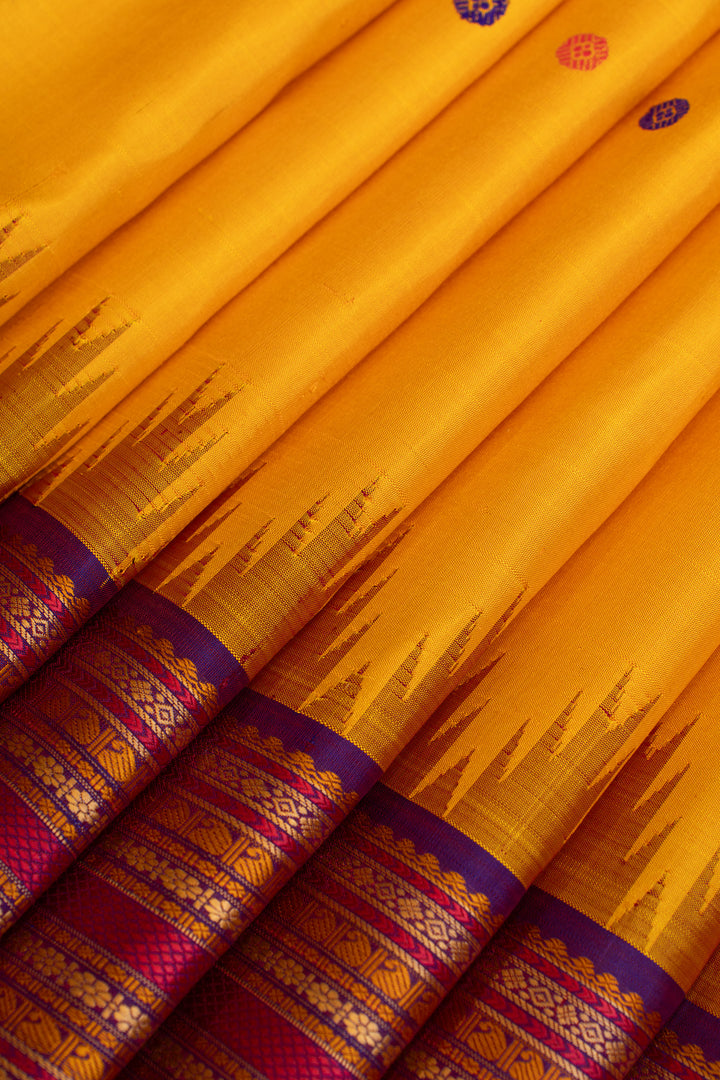 Yellow and purple threadwork Kanchipuram silk saree