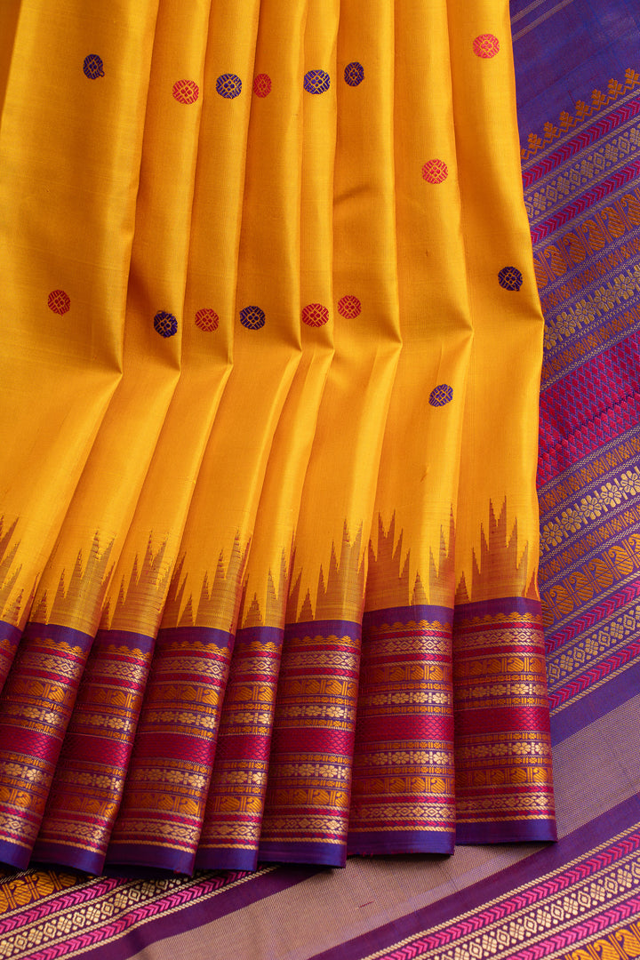 Yellow and purple threadwork Kanchipuram silk saree
