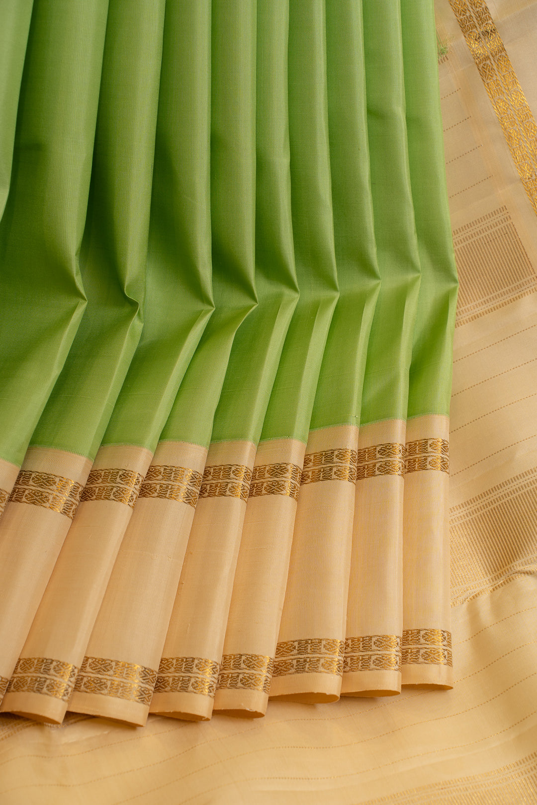 Green and ivory pure Kanchipuram silk Saree