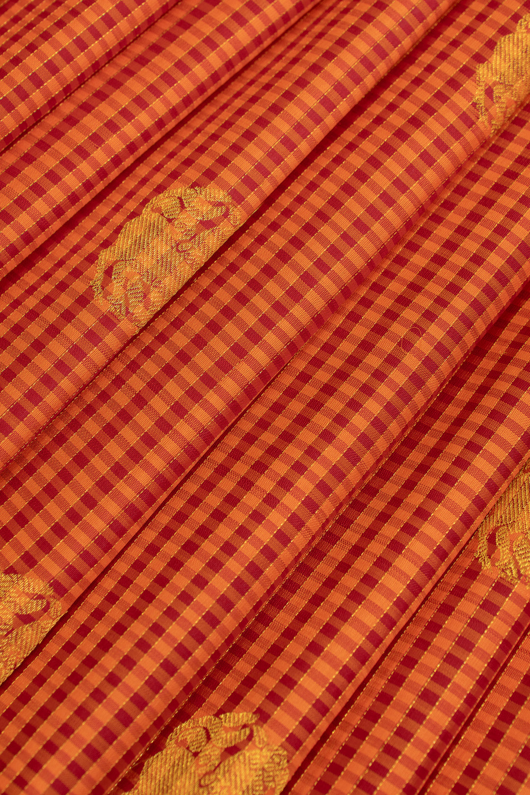 Rust orange borderless checks  pure Kanchipuram silk saree