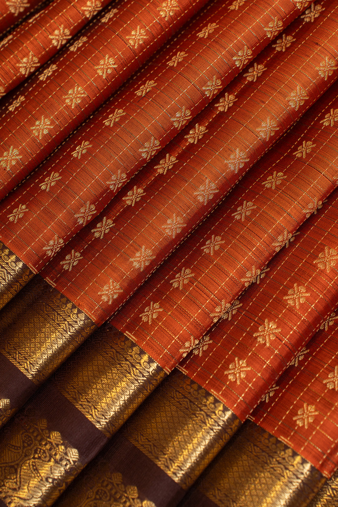 Rust orange and brown zari panel pure Kanchipuram silk saree