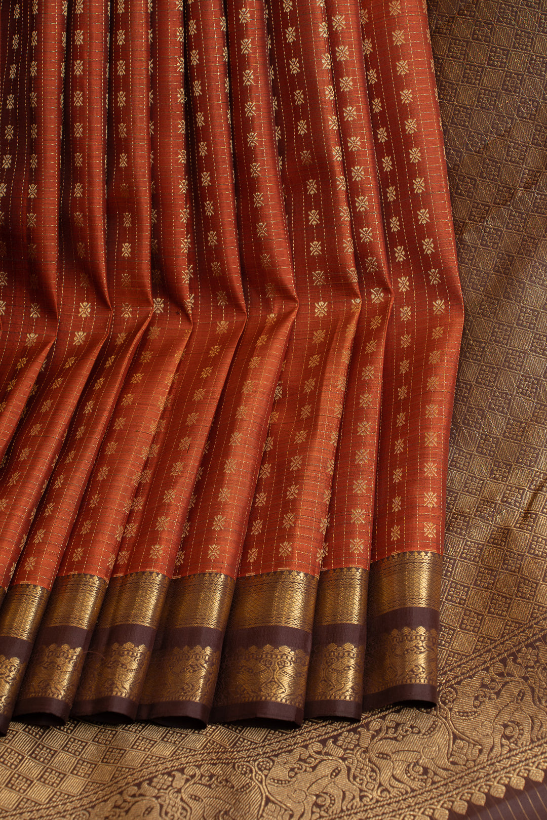 Rust orange and brown zari panel pure Kanchipuram silk saree