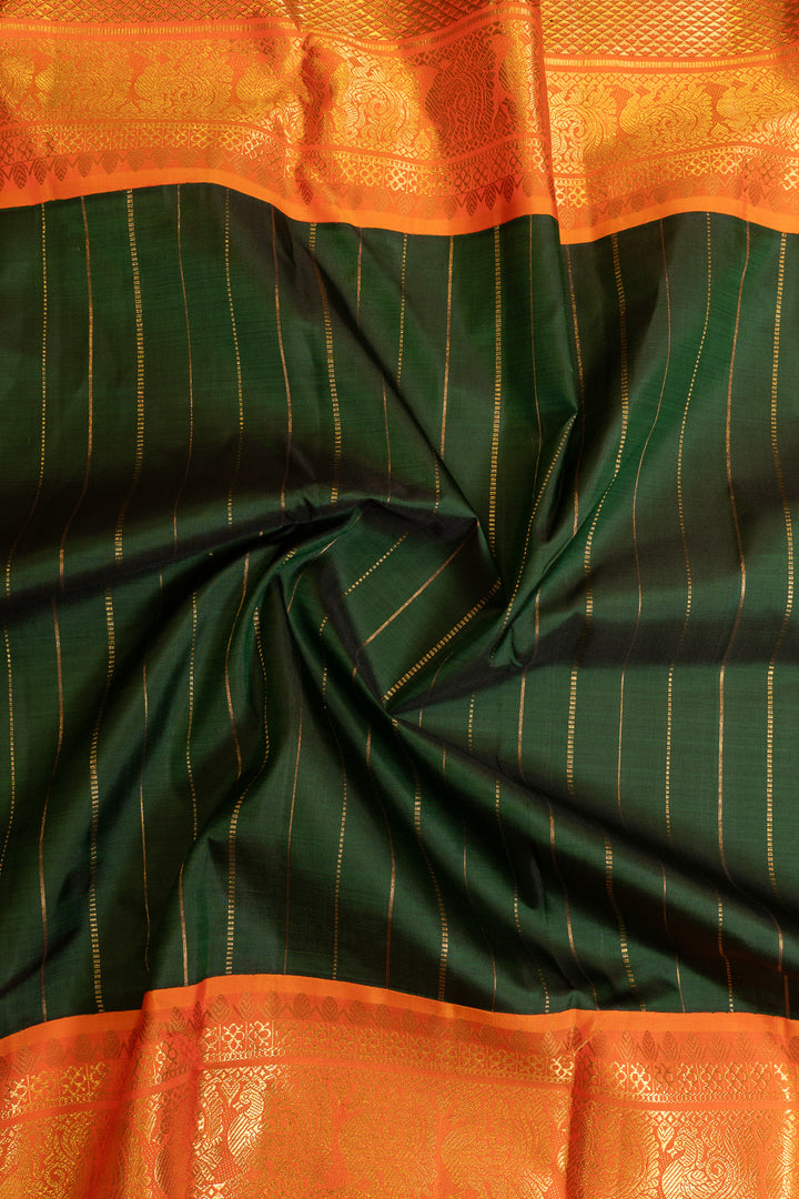 Emerald green and orange grand borders pure Kanchipuram silk saree