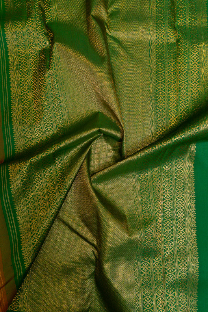 Orange and green lakshadeepam turning border pure Kanchipuram silk saree