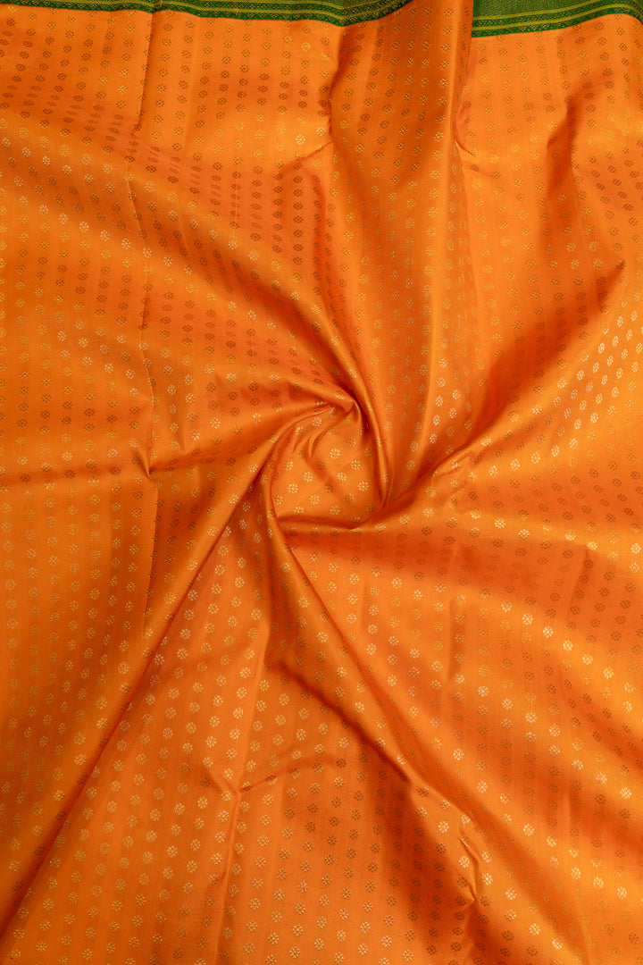 Orange and green lakshadeepam turning border pure Kanchipuram silk saree