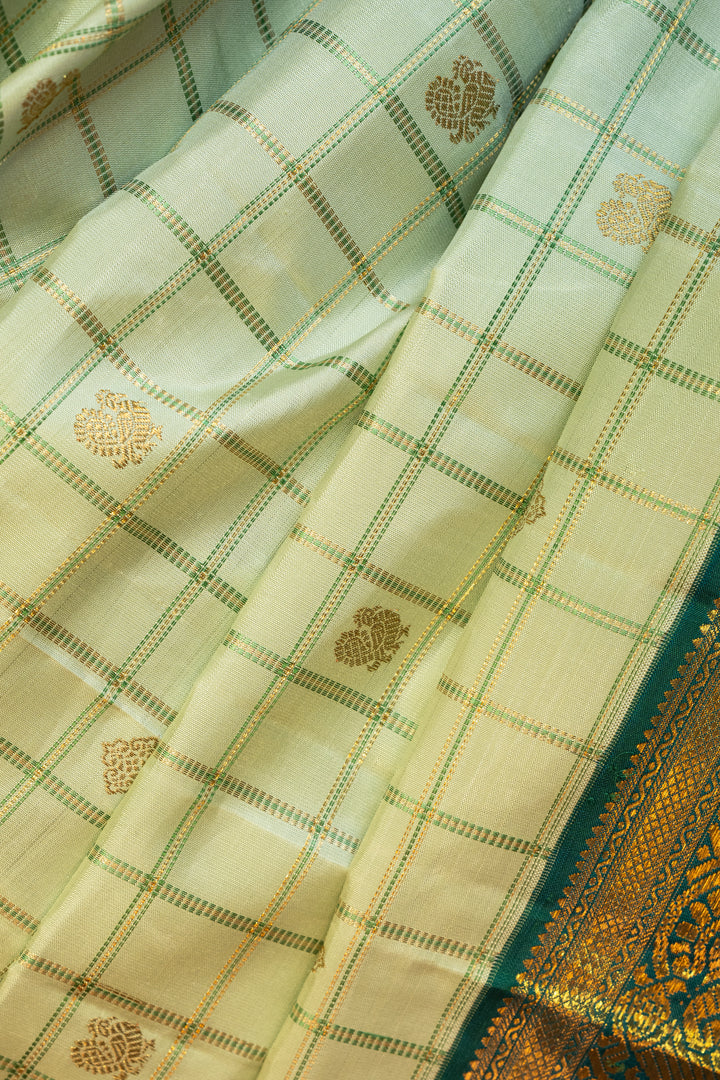 Mint green and bottle green pure kanchipuram silk saree