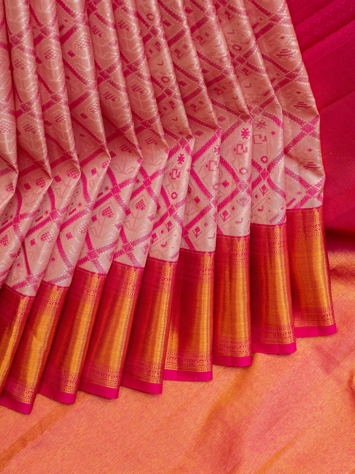 Cream and pink Ikat Woven Pure Kanchipuram Silk Saree