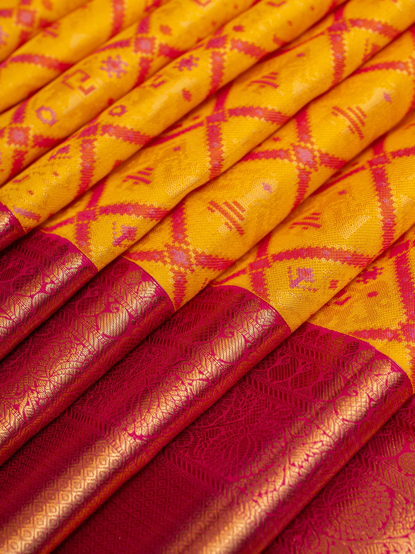 Yellow and Pink Ikat Woven Pure Kanchipuram Silk Saree