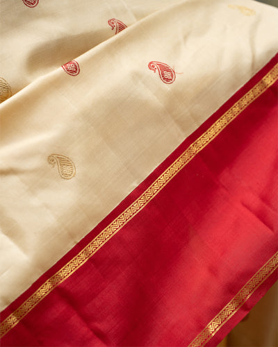 Cosmic Latte Cream and Red Pure Kanchipuram Silk Saree - Clio Silks