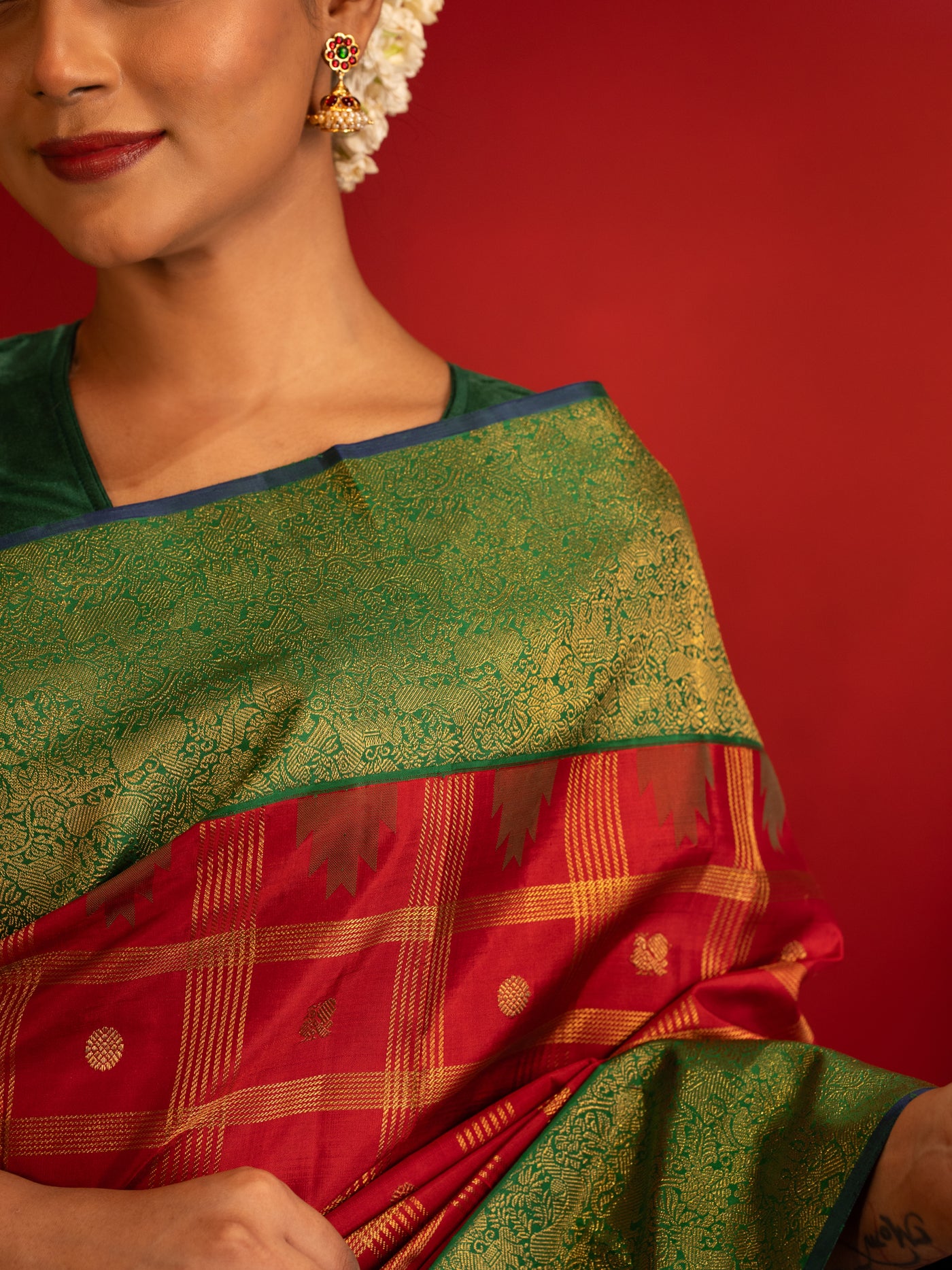 Maroon and green vanasingaram pure zari Kanchipuram silk saree