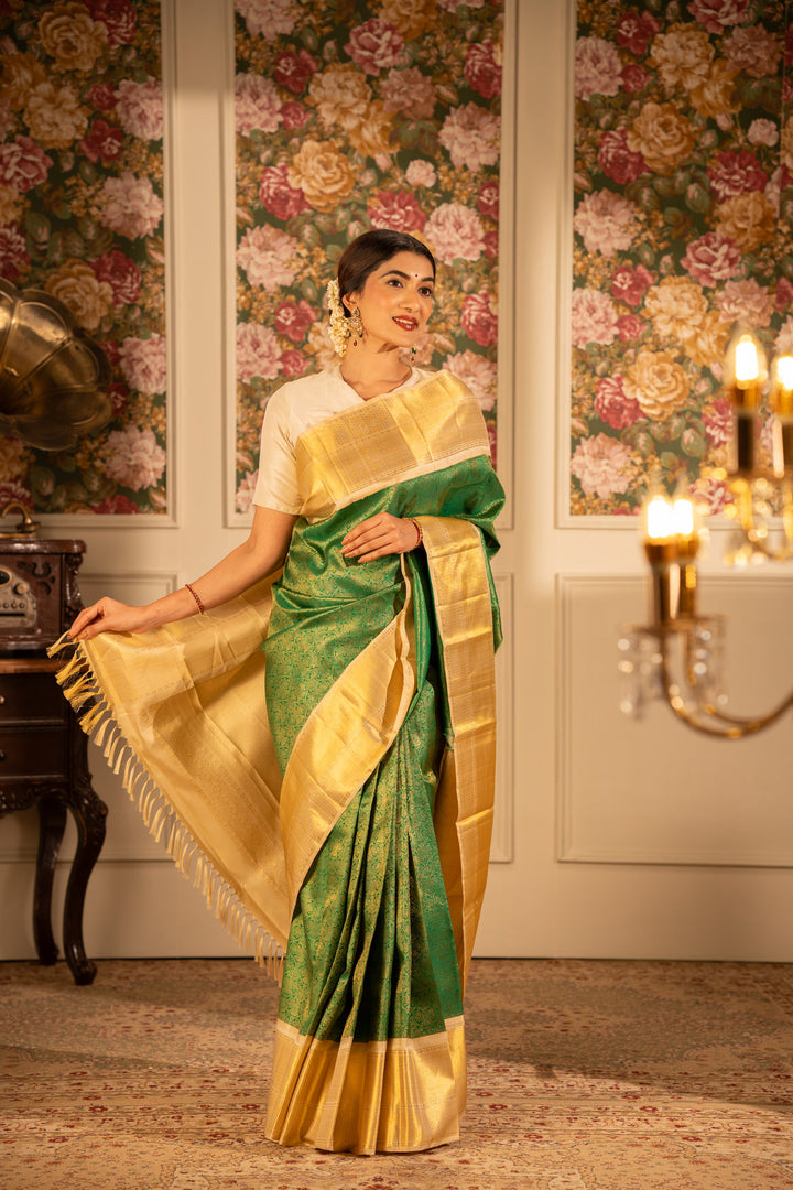 Emerald Green and Gold iruthalaipakshi brocade pure Kanchipuram silk saree