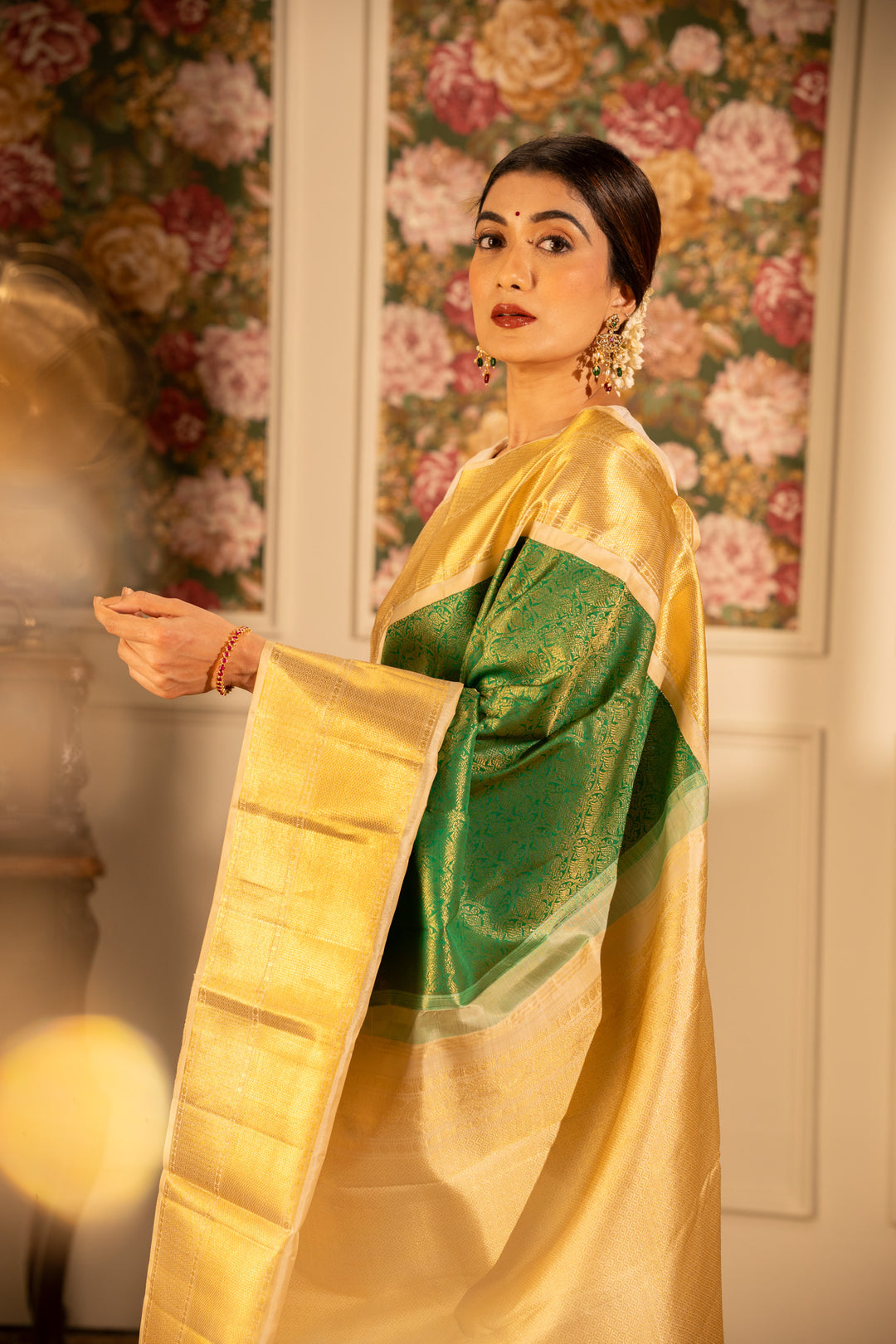 Emerald Green and Gold iruthalaipakshi brocade pure Kanchipuram silk saree