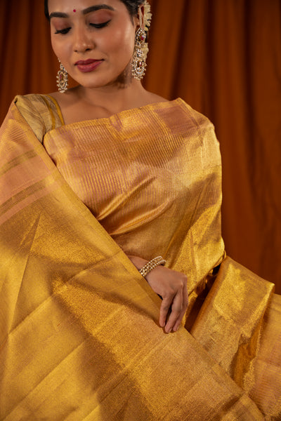 Gold and peach tissue ettu kol pure zari Kanchipuram silk saree