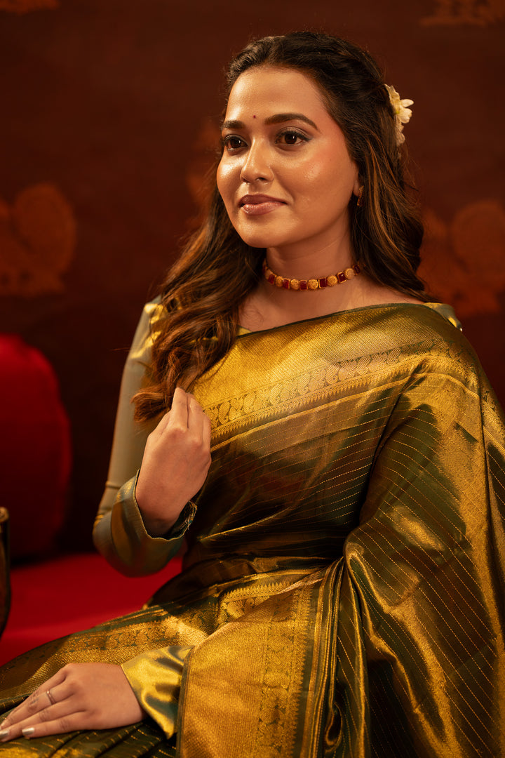 Emerald green vintage stripes tissue Kanchipuram silk saree