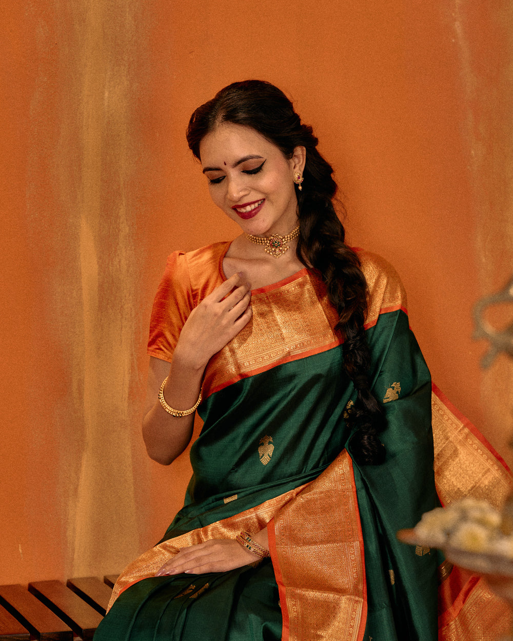 Bottle green and orange iruthalaipakshi pure Kanchipuram silk saree