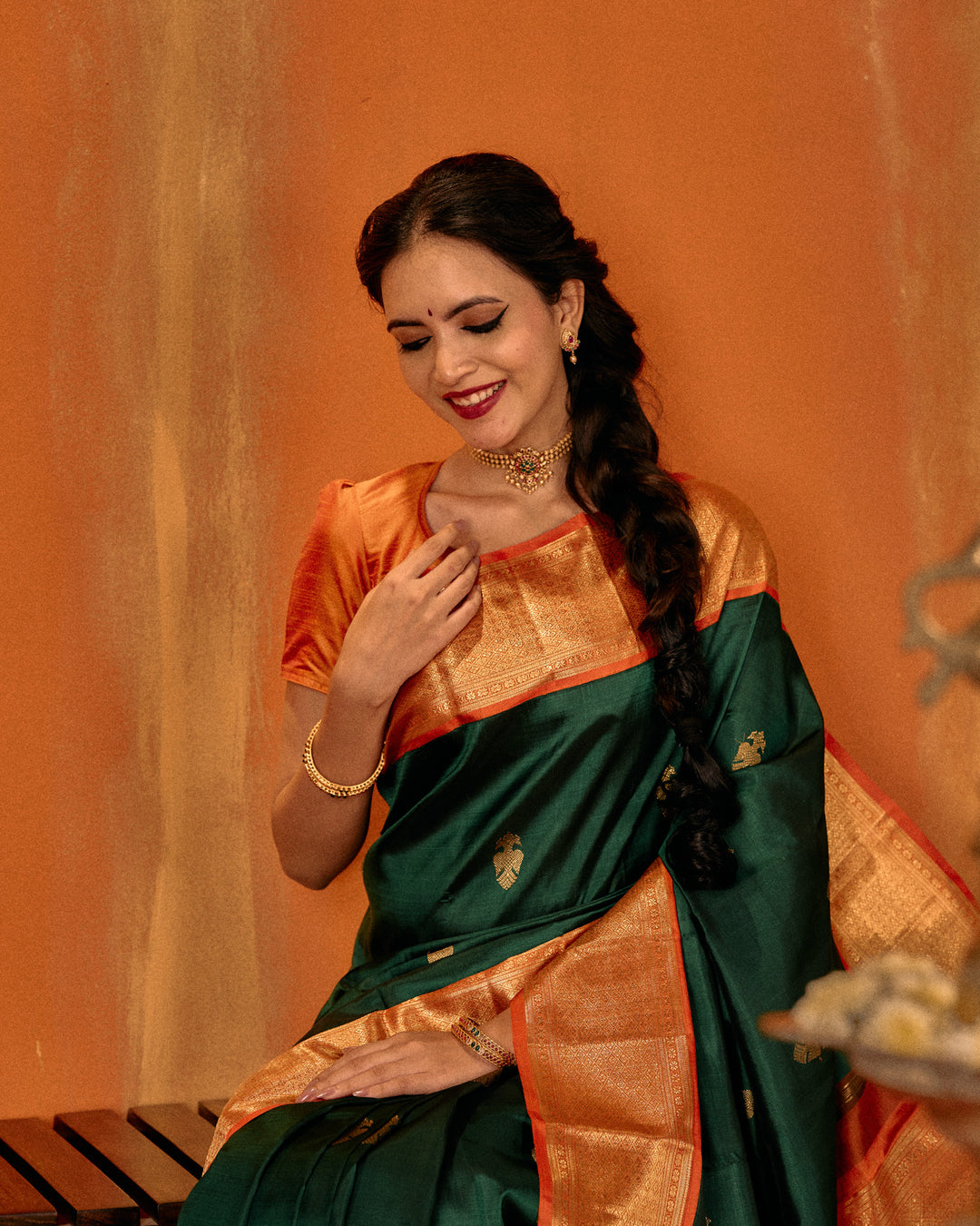 Bottle green and orange iruthalaipakshi pure Kanchipuram silk saree