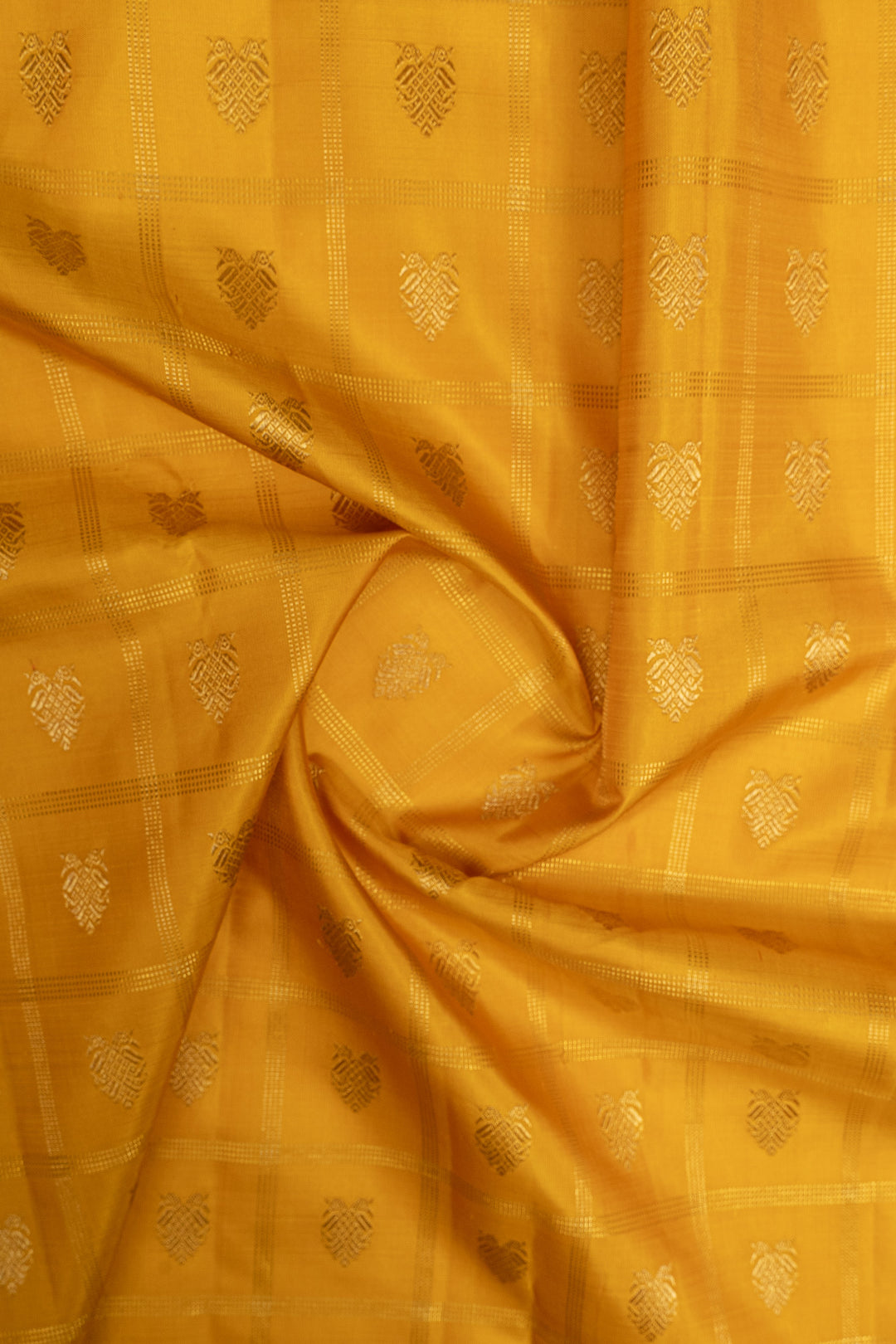 Golden yellow and green iruthalaipakshi vintage checks pure kanchipuram silk saree