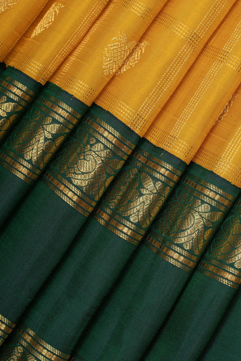 Golden yellow and green iruthalaipakshi vintage checks pure kanchipuram silk saree