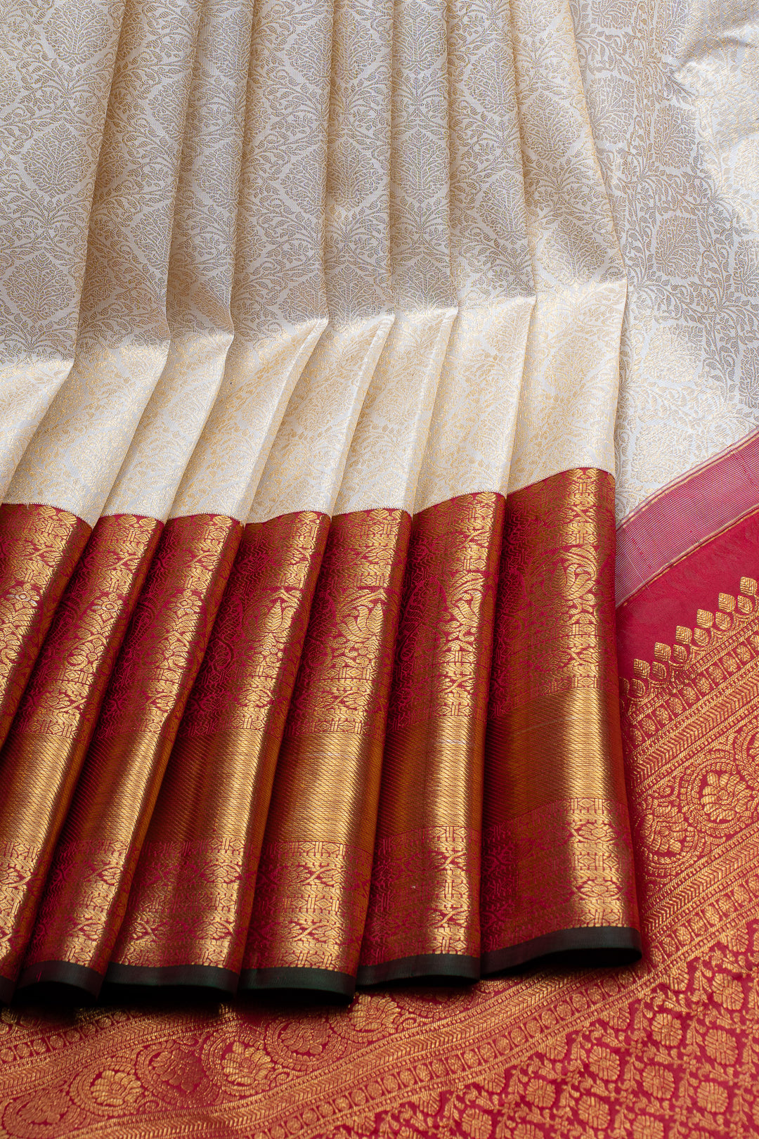Ivory and red floral brocade pure kanchipuram silk saree
