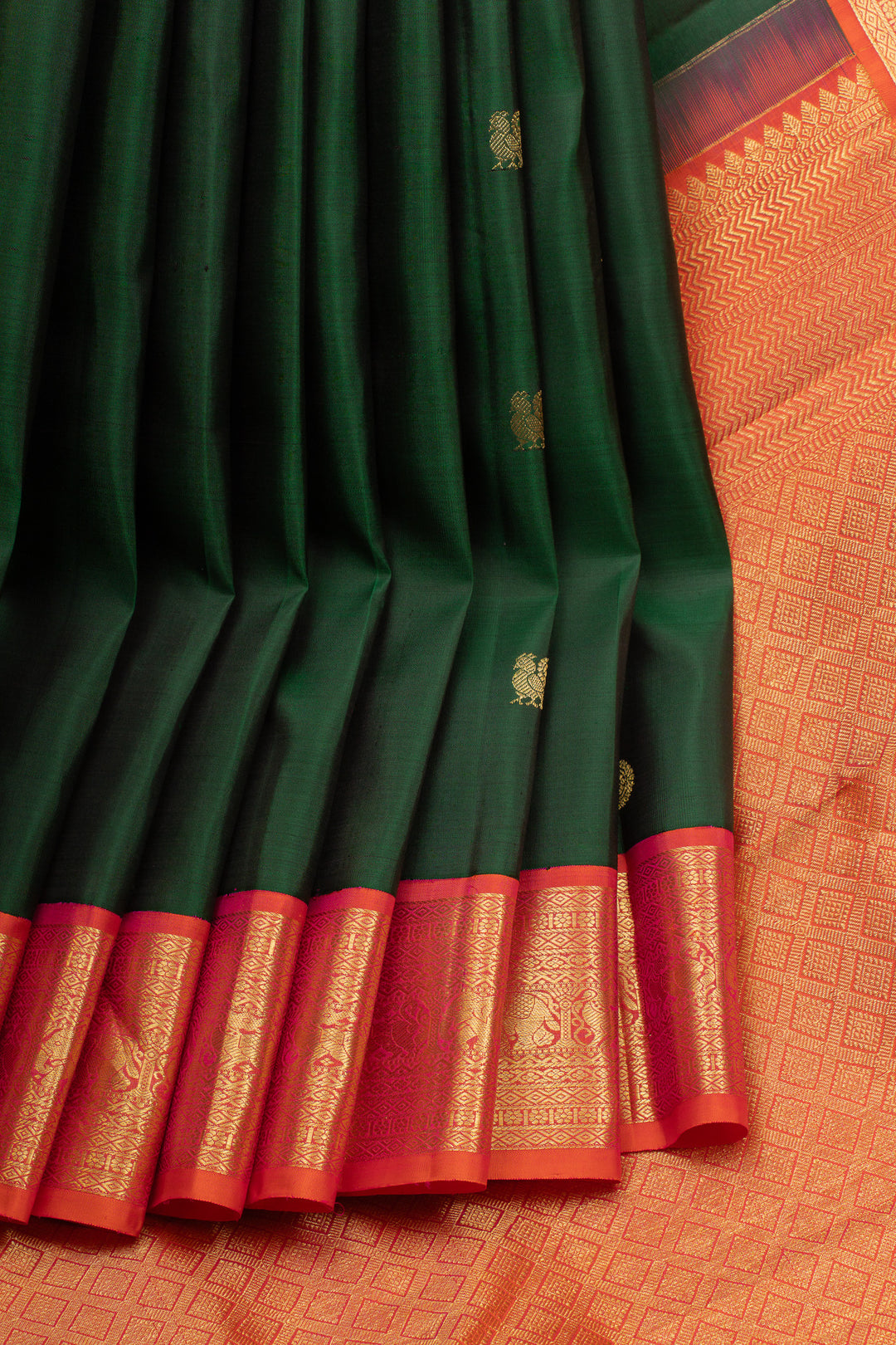 Bottle green and peach orange pure kanchipuram silk saree