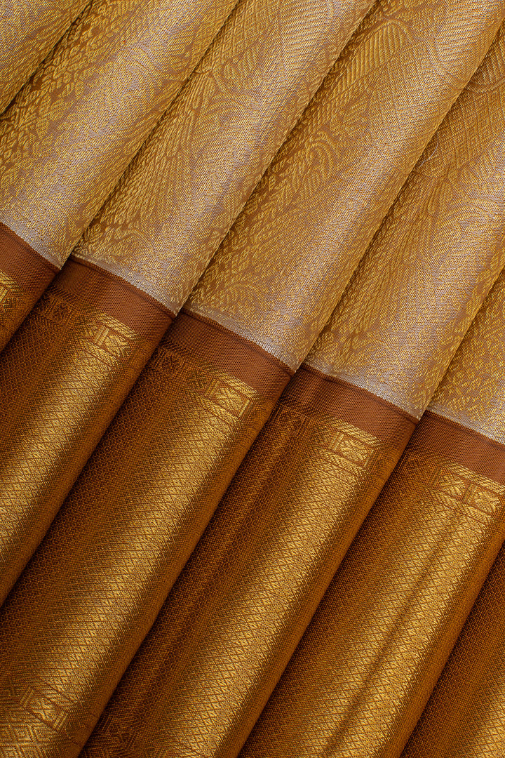 Champagne gold iruthalaipakshi brocade pure kanchipuram silk saree