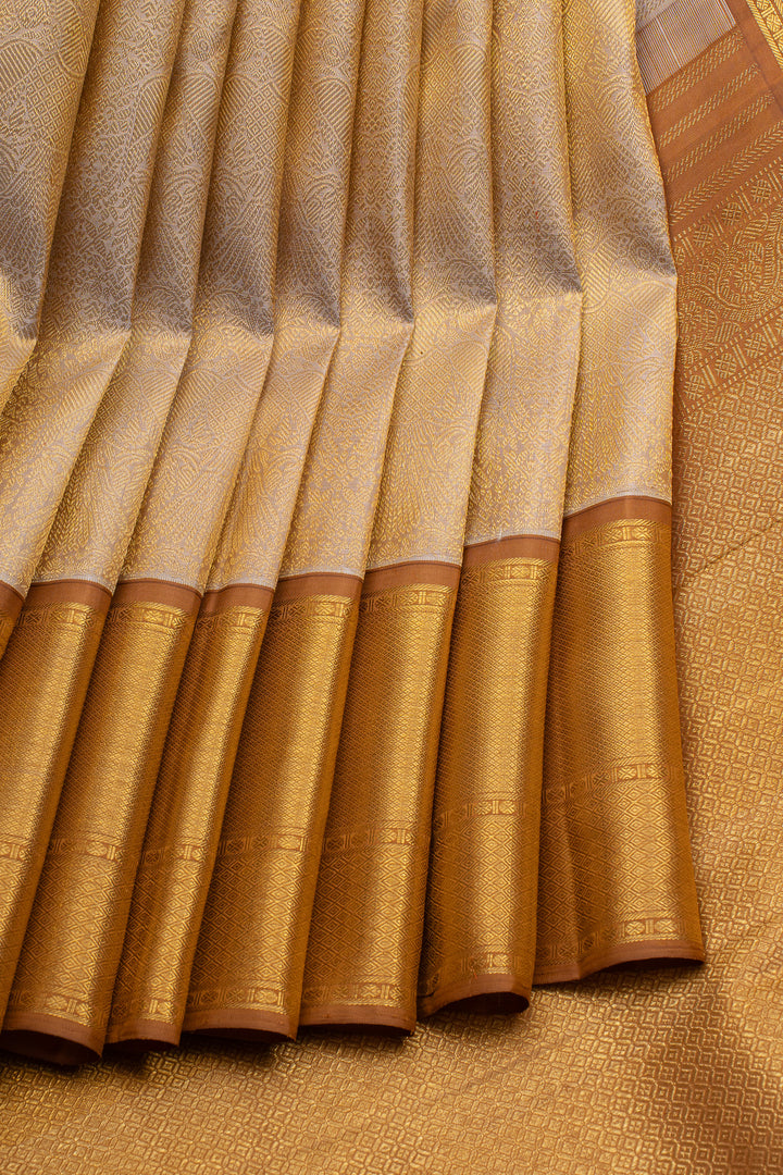 Champagne gold iruthalaipakshi brocade pure kanchipuram silk saree