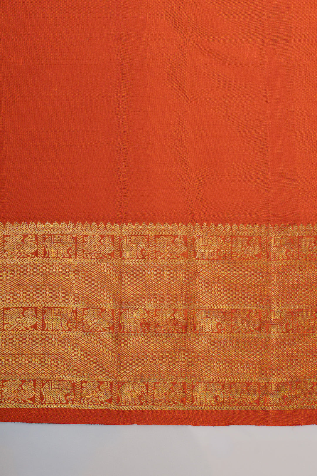 Rust orange turning border traditional pure kanchipuram silk saree
