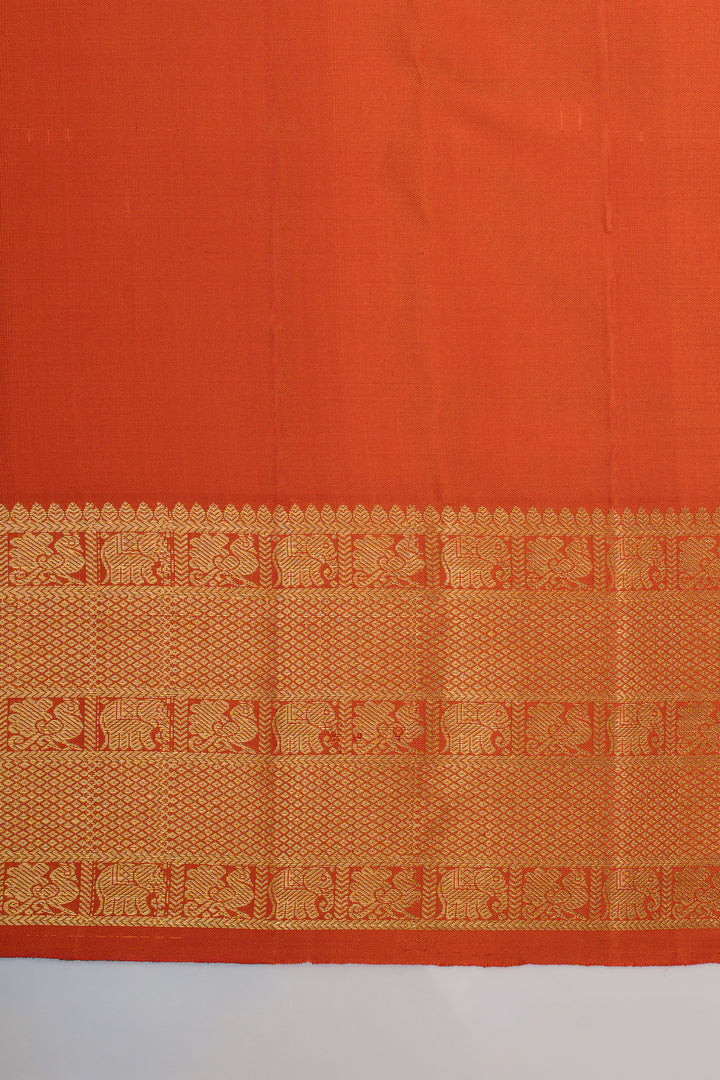 Rust orange turning border traditional pure kanchipuram silk saree