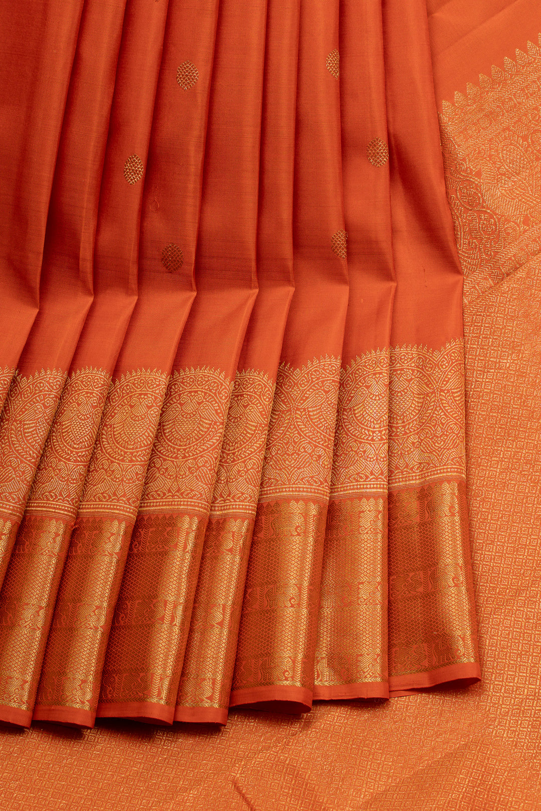 Rust orange turning border traditional pure kanchipuram silk saree