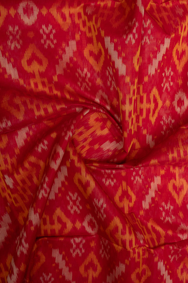 Red and green Ikat silk cotton saree